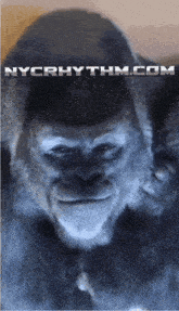 a picture of a gorilla with nycrhythm.com on the bottom