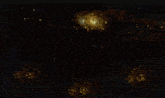 a blurred image of a dark room with a lot of lights