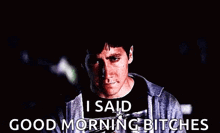 a man is standing in the dark and saying i said good morning bitches