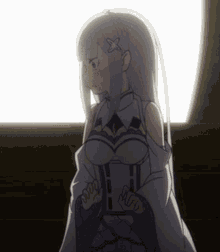 a girl with a star in her hair is looking out a window
