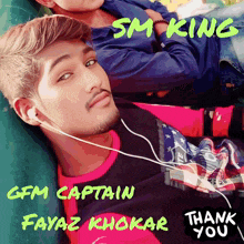 a gfm captain fayaz khokar is laying on a green couch