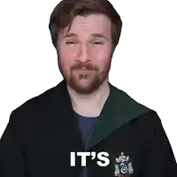 a man with a beard is wearing a slytherin robe that says it 's