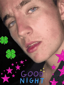 a man 's face is surrounded by stars and the words " good night "