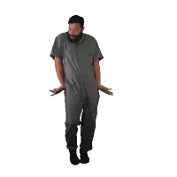 a man with a beard wearing a grey jumpsuit is dancing