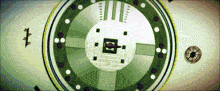 a green and white circle with the letter e in the center