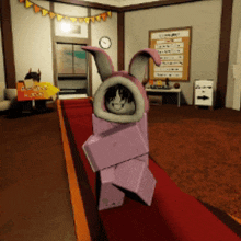 a girl in a pink bunny costume is standing on a red carpet in a room