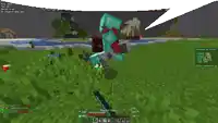 a screenshot of a minecraft game shows a man in a blue armor standing next to a river