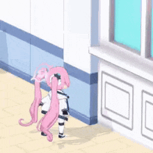 a girl with pink hair is standing in a hallway with a sign that says wow there are a lot of interesting things here .