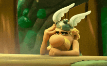 a cartoon character wearing a helmet with wings on his head