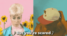 a woman and a man are standing next to each other with the words but you 're scared