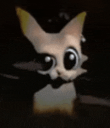 a cartoon cat with big eyes and a yellow ear is looking at the camera in the dark .