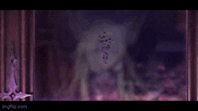 a blurred image of a girl with long hair and horns standing in front of a purple curtain .