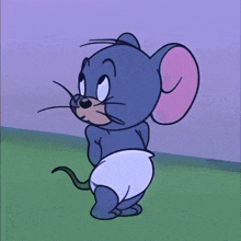 a cartoon mouse wearing a diaper smiles for the camera