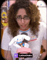 a woman with curly hair is wearing a shirt that says no friends on it