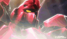 a close up of a red robot with a yellow light coming out of its eyes .