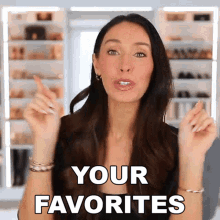 a woman says " your favorites " while pointing up