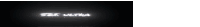 a sign that says zeo ultra is lit up in a dark room