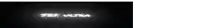 a sign that says zeo ultra is lit up in a dark room