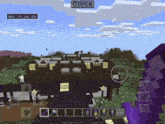 a screenshot of a minecraft game shows a purple sword