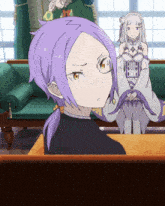 a girl with purple hair is sitting at a table with another girl