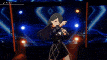 a girl singing into a microphone on a stage