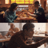 a man and a woman are sitting at a table in a restaurant eating pizza
