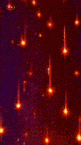 a close up of a woman 's face with red stars falling from her hair