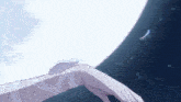 a close up of a person 's arm with a feather flying in the sky .