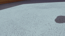 a person 's shadow is cast on a concrete surface while wearing a prosthetic leg