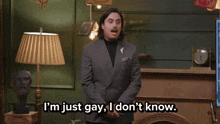 a man in a suit says i 'm just gay i don t know