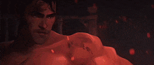 a person is holding a sword in a dark room with a fire coming out of it .