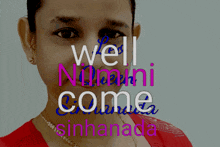 a woman is smiling in front of a sign that says well nilmini come sinhanada