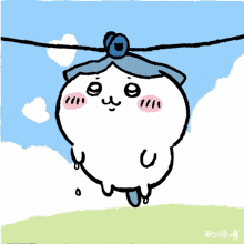 a cartoon character with a blue hat is hanging from a clothesline