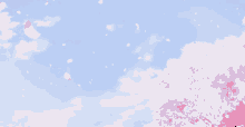 a blue sky with white clouds and petals falling