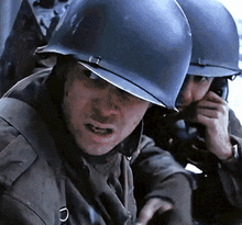 a man wearing a helmet with the letter d on the front