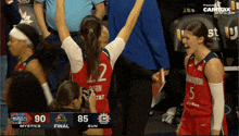 a basketball game between the mystics and the sun is being played