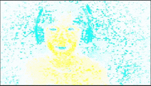 a painting of a woman 's face with yellow and blue spots