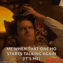 a man is laying on a couch with an ice pack on his head and the words me when that one ho starts talking again