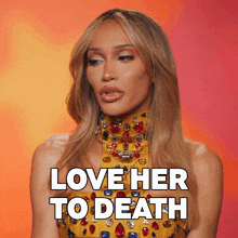 a woman says love her to death while wearing a gold dress
