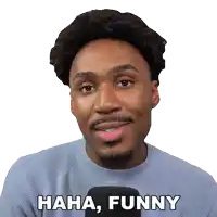 a man with a beard says " haha funny "
