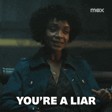 a woman says you 're a liar while sitting in a chair