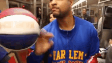 harlem globetrotter basketball thumbs up wink