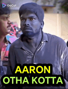 a cartoon of a man with the words aaron otha kotta