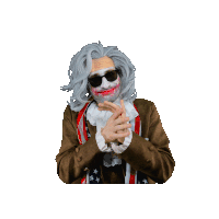 a man in a wig and sunglasses is making a gesture with his hands
