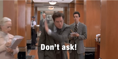 a man in a suit says 