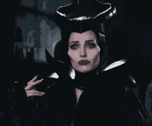 maleficent angelina jolie frown sad smile
