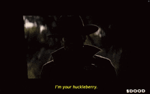 a cartoon of a man wearing a hat and goggles says " i 'm your huckleberry "