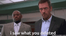 a man in a suit says i saw what you deleted next to another man in a suit