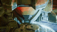 a close up of a robot 's torso with a blue light shining through it