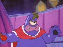 a cartoon character is wearing a red cape and a mask .